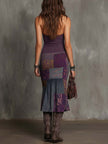 FJØRNA knit halter neck midi dress for women, showcasing a stylish sleeveless design with a fitted waist and midi length.