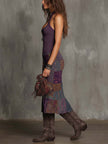 FJØRNA knit halter neck midi dress for women, featuring a fitted sleeveless design and elegant midi length in soft knit fabric.
