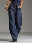 Dark blue denim FJØRNA women's multi-pocket sleeveless balloon jumpsuit with relaxed fit and stylish design.