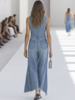 Light blue denim sleeveless wide-leg jumpsuit with raw edges, styled as women's pants from FJØRNA.