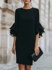 FJØRNA black ruffled sheer sleeve midi dress, stylish cocktail dress with elegant ruffle details and sheer sleeves.