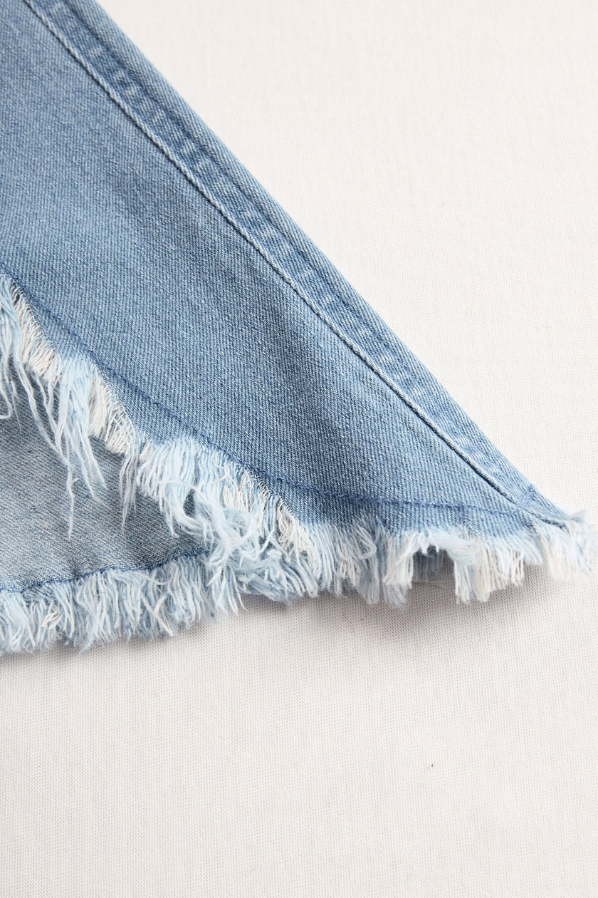 Light blue denim sleeveless wide-leg jumpsuit with raw edges, designed for women by FJØRNA, styled as pants in the image.