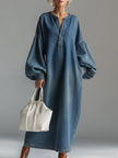 Blue denim maxi dress by FJØRNA featuring a flowing silhouette, sleeveless design, and casual-chic style perfect for evening wear.