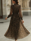 FJØRNA leopard print wrap midi dress with long sleeves, stylish and fitted for a fashionable look.