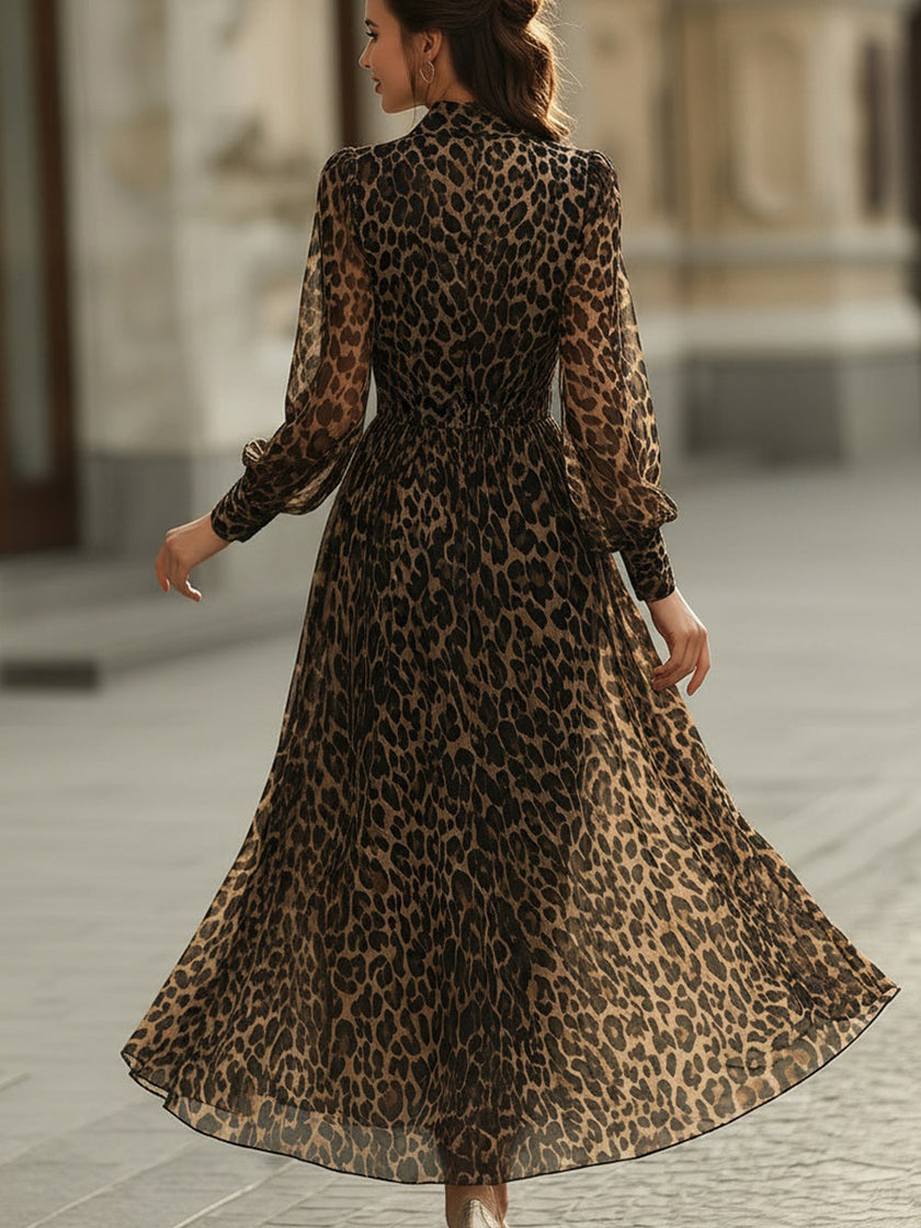 FJØRNA leopard print wrap midi dress with long sleeves, stylish and fitted for a fashionable look.