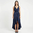 Women's elegant sleeveless wrap midi dress by FJØRNA, showcasing a stylish design with a fitted waist and flowing fabric.