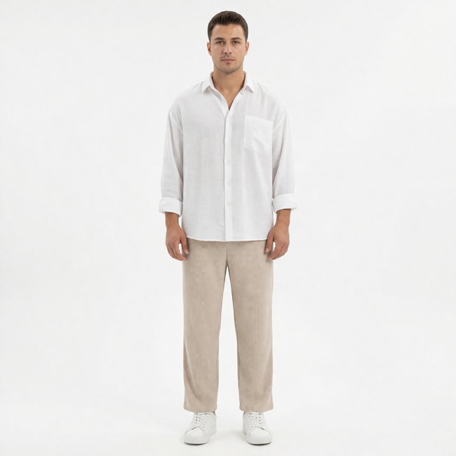 Men's wide-leg summer pants by FJØRNA, casual fit with lightweight fabric, shown in a natural standing pose.