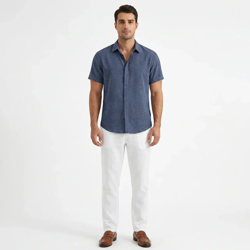 Men's FJØRNA cotton-linen short sleeve shirt, lightweight and breathable, shown in a natural fabric weave with a classic collar and button front.