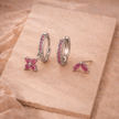 Unisex minimalist piercing set featuring stainless steel hoops and studs, suitable for women’s accessory collection.