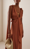FJØRNA Ocean Mysteries draped maxi dress in flowing fabric with ocean-inspired print, full-length view on model.