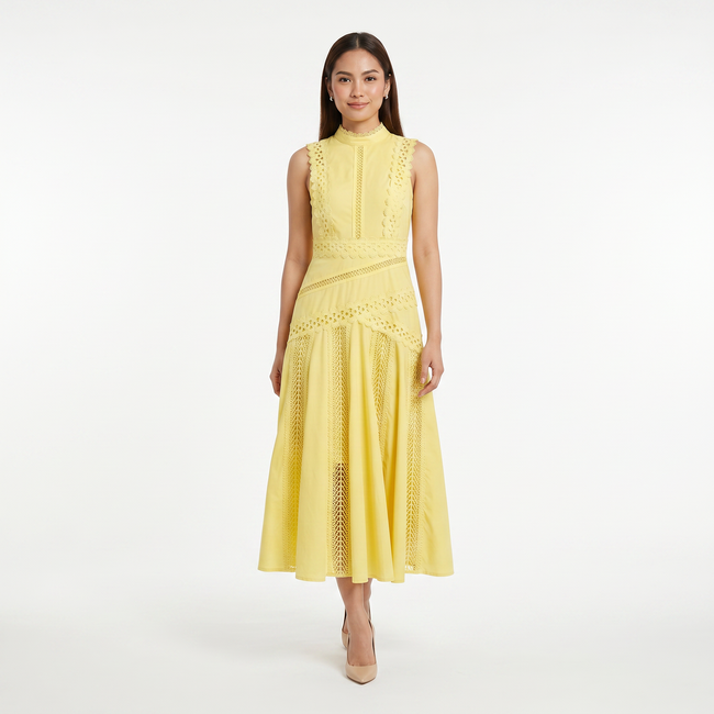 FJØRNA women's sleeveless lace panel midi dress displayed on a hanger, showcasing intricate lace details and elegant length.
