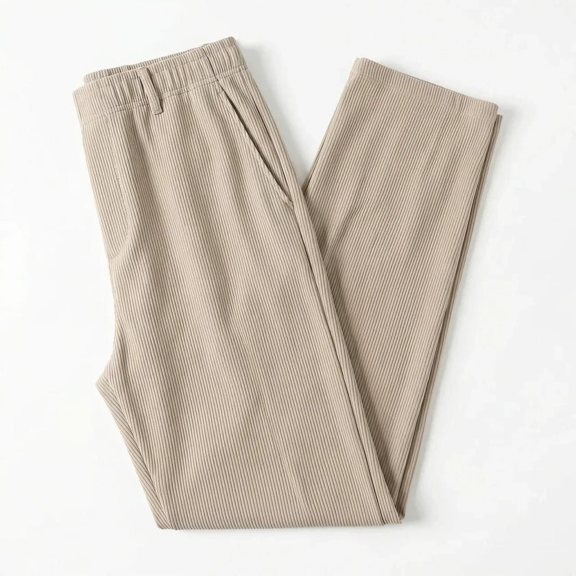 Men's wide-leg summer pants by FJØRNA, featuring lightweight fabric and relaxed fit, displayed on a model against a neutral background.