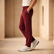Men's wide-leg drawstring joggers from FJØRNA featuring relaxed fit casual sweatpants with elastic waistband and side pockets.