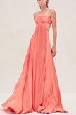 FJØRNA Sunset Cutout Plisse Maxi Dress featuring a flowy silhouette with cutout details, perfect for elegant cocktail occasions