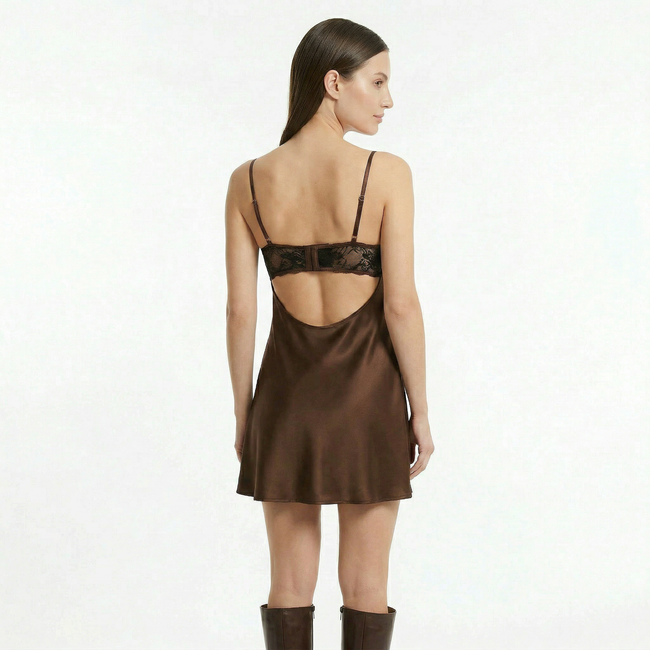 Women's lace satin mini dress by FJØRNA featuring delicate lace details and a sleek satin finish, perfect for elegant occasions.