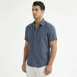 Men's cotton-linen short sleeve shirt by FJØRNA, shown in a relaxed fit with a button-up front and classic collar.