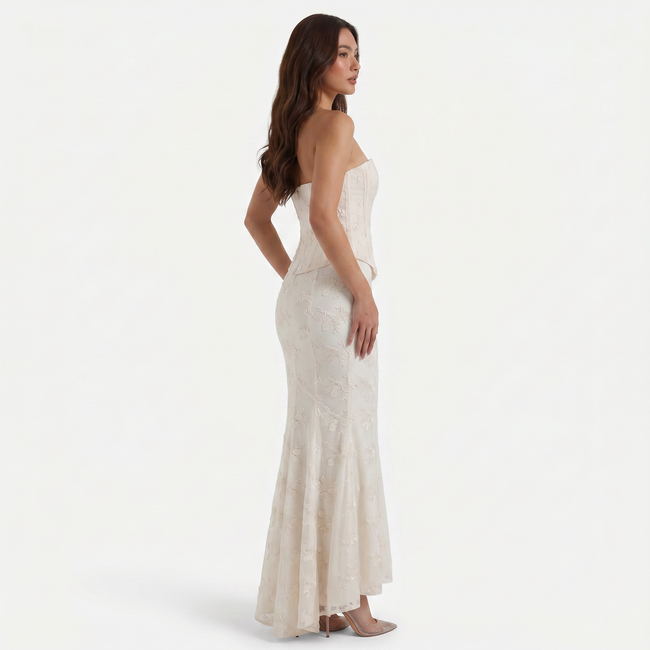 FJØRNA women's strapless lace corset maxi dress with fitted bodice and flowing skirt, elegant evening wear for special occasions.