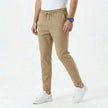 Men's stretchable comfort trousers by FJØRNA, shown in a relaxed fit with a versatile waistband and casual style.