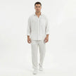 Men's wide-leg summer pants by FJØRNA, shown in light fabric with relaxed fit, perfect for warm weather casual wear.