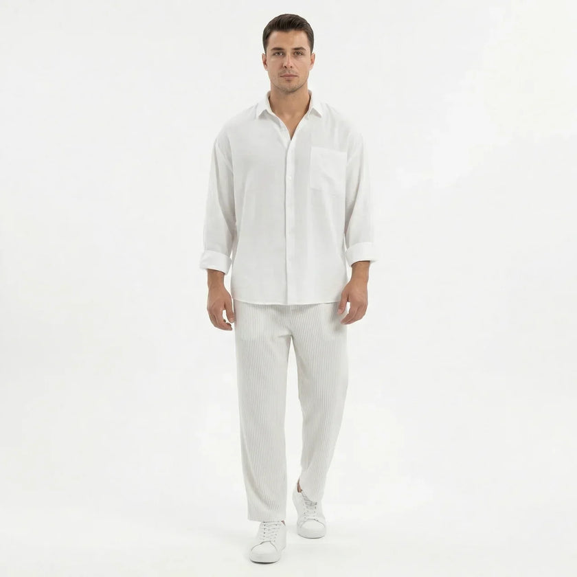 Men's wide-leg summer pants by FJØRNA, shown in light fabric with relaxed fit, perfect for warm weather casual wear.