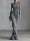 Grey knit ruched maxi dress by FJØRNA, elegant evening dress with a fitted silhouette and stylish ruching detail.
