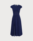FJØRNA Polka dot cutout cap-sleeve midi dress, summer business dress with stylish cutouts and elegant design, displayed on a model.