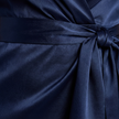 FJØRNA elegant satin maxi dress for women with halter neck and ruffle details, perfect for formal occasions.