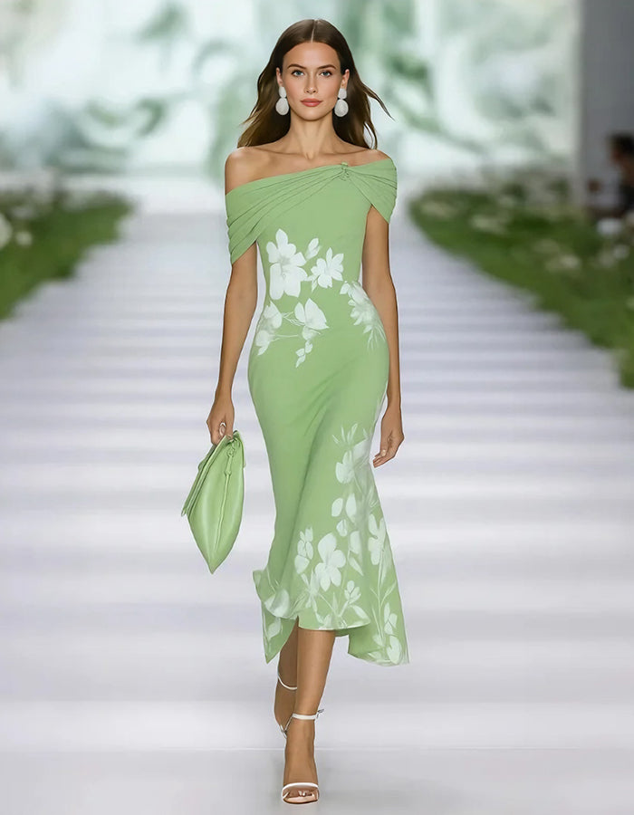 FJØRNA green lace midi dress for women, elegant floral design, fitted waist, and knee-length hem, perfect for special occasions.