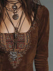 Brown suede embroidered boho mini dress by FJØRNA featuring a leather dress look with intricate embroidery and a flowy silhouette.