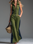 FJØRNA green sleeveless jumpsuit with stand collar and front zip, featuring slim pants for women, stylish and modern design.