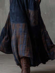FJØRNA suede patchwork maxi dress for women featuring a flowing silhouette and mixed suede patchwork details.
