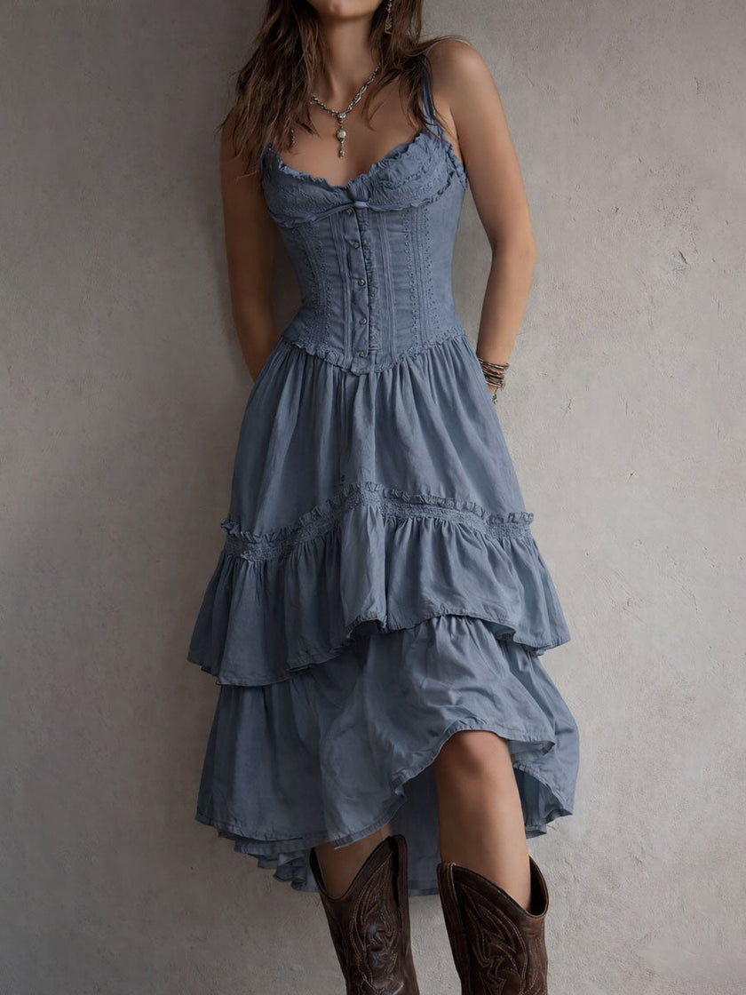 FJØRNA retro boho corset tiered midi dress with lace trim, featuring flowing fabric and vintage-inspired design.