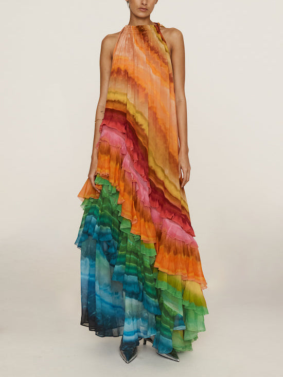 Colorful print ruffle maxi dress for women by FJØRNA, featuring vibrant summer design and flowing fabric.