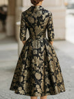 FJØRNA black and gold floral jacquard midi dress with elegant tie waist, stylish and sophisticated women's dress for special occasions.