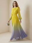 FJØRNA high waisted long sleeve maxi dress with belt, contrast color gradient, pleated split-joint, and round neck design.