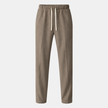Men's wide-leg drawstring joggers by FJØRNA, relaxed casual sweatpants with elastic waistband and loose fit, shown in gray.