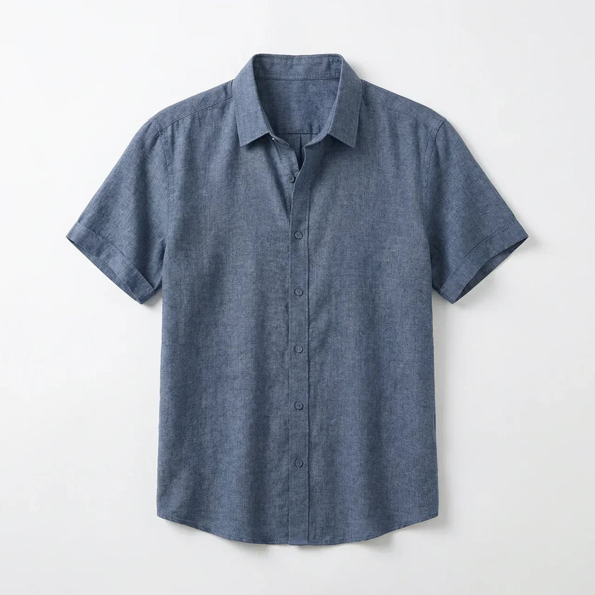 Men's FJØRNA cotton-linen short sleeve shirt with a relaxed fit, featuring a button-up front and classic collar on a plain background.