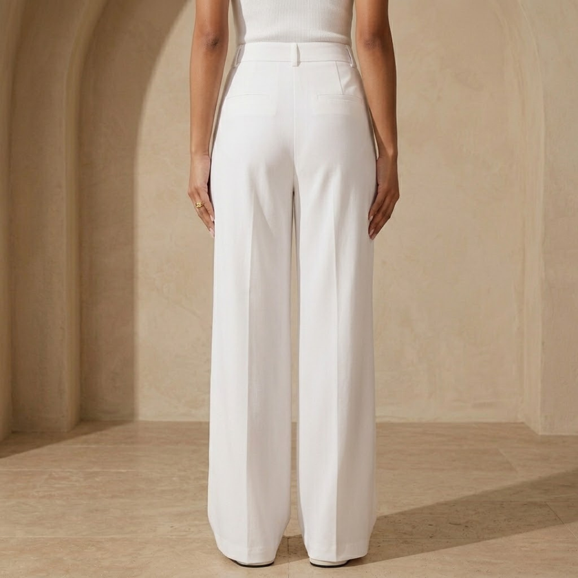 Women's high-waist wide-leg tailored trousers by FJØRNA, loose pull-on pants with a relaxed fit and elegant style.
