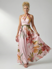 FJØRNA women's summer maxi dress with floral pattern, halter neck, sleeveless design, relaxed fit for warm weather.
