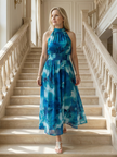 FJØRNA women's summer midi dress with halter neck, sleeveless design, perfect for casual occasions.