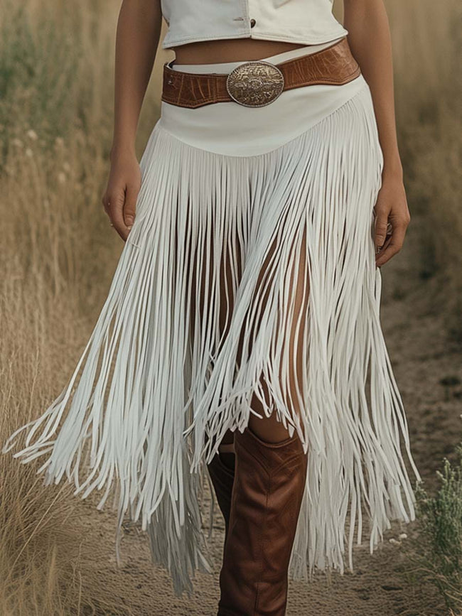 White suede tassel dress by FJØRNA featuring a casual style with tassel details and a relaxed fit.