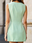 Mint FJØRNA pleated A-line mini dress with short sleeves and a fitted waist, showcased on a mannequin.