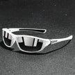 FJØRNA men's polarized wraparound UV400 sports sunglasses with black frame and tinted lenses for outdoor activities.