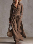 Red linen maxi dress by FJØRNA, casual style, flowing fabric, and sleeveless design shown on a model.