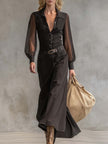 Black denim V-neck maxi dress by FJØRNA, casual style, flowing long dress with sleeveless design and V-shaped neckline.