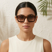 FJØRNA vintage 90s rectangular unisex sunglasses with retro style, black frames and tinted lenses, accessories for women and men.