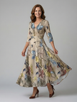 FJØRNA women’s summer maxi dress with floral print, V-neck and wrap style, flowing and lightweight for warm weather wear.
