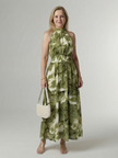 FJØRNA summer midi dress for women featuring a halter neck, sleeveless design, and flowy fabric perfect for warm weather.