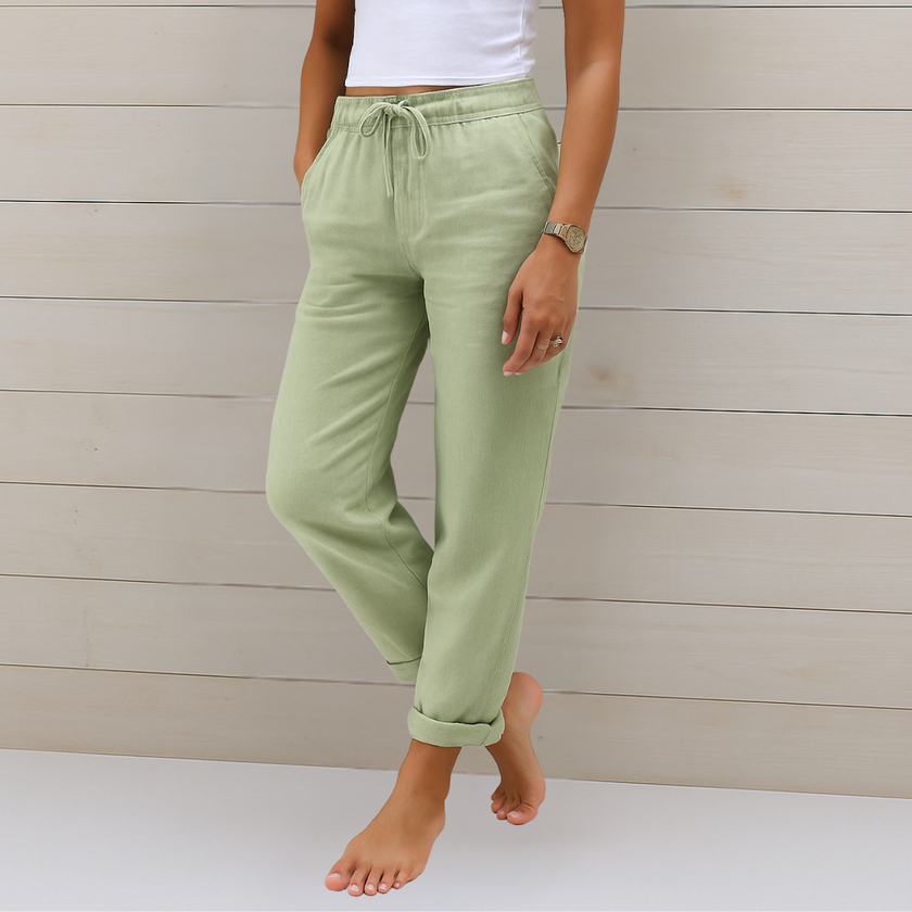 FJØRNA women's lightweight summer trousers with elastic waist, breathable fabric, and relaxed fit for casual wear.