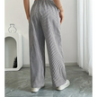 FJØRNA lightweight summer women's trousers with drawstring and striped pattern, relaxed fit for casual warm-weather wear.